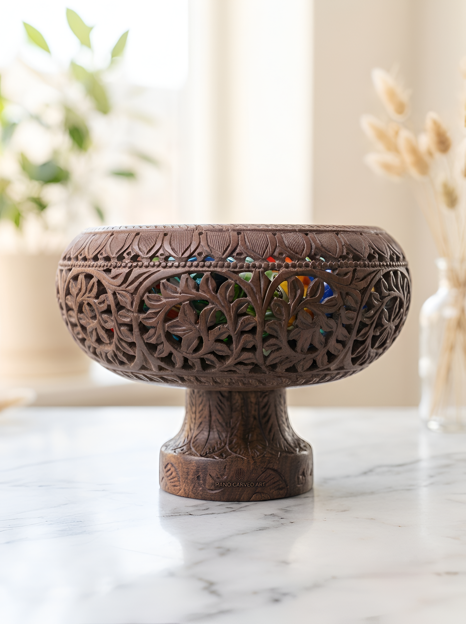 Carved natural-stone bowl on a pedestal